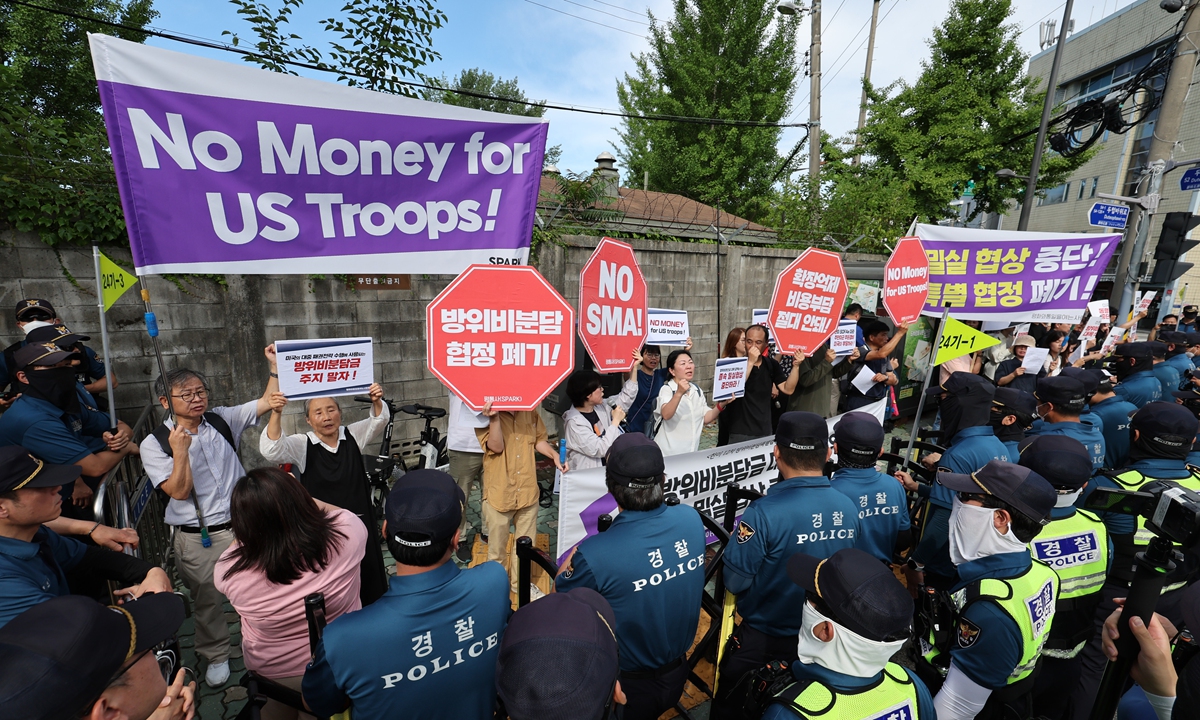 A civic group in South Korea holds a press conference on July 10, 2024, in Seoul, near the campus of the Korea National Defense University, demanding the cessation of negotiations regarding the sharing of defense costs between South Korea and the US. Photo: VCG